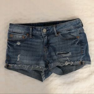 Low rise distressed jean shorts